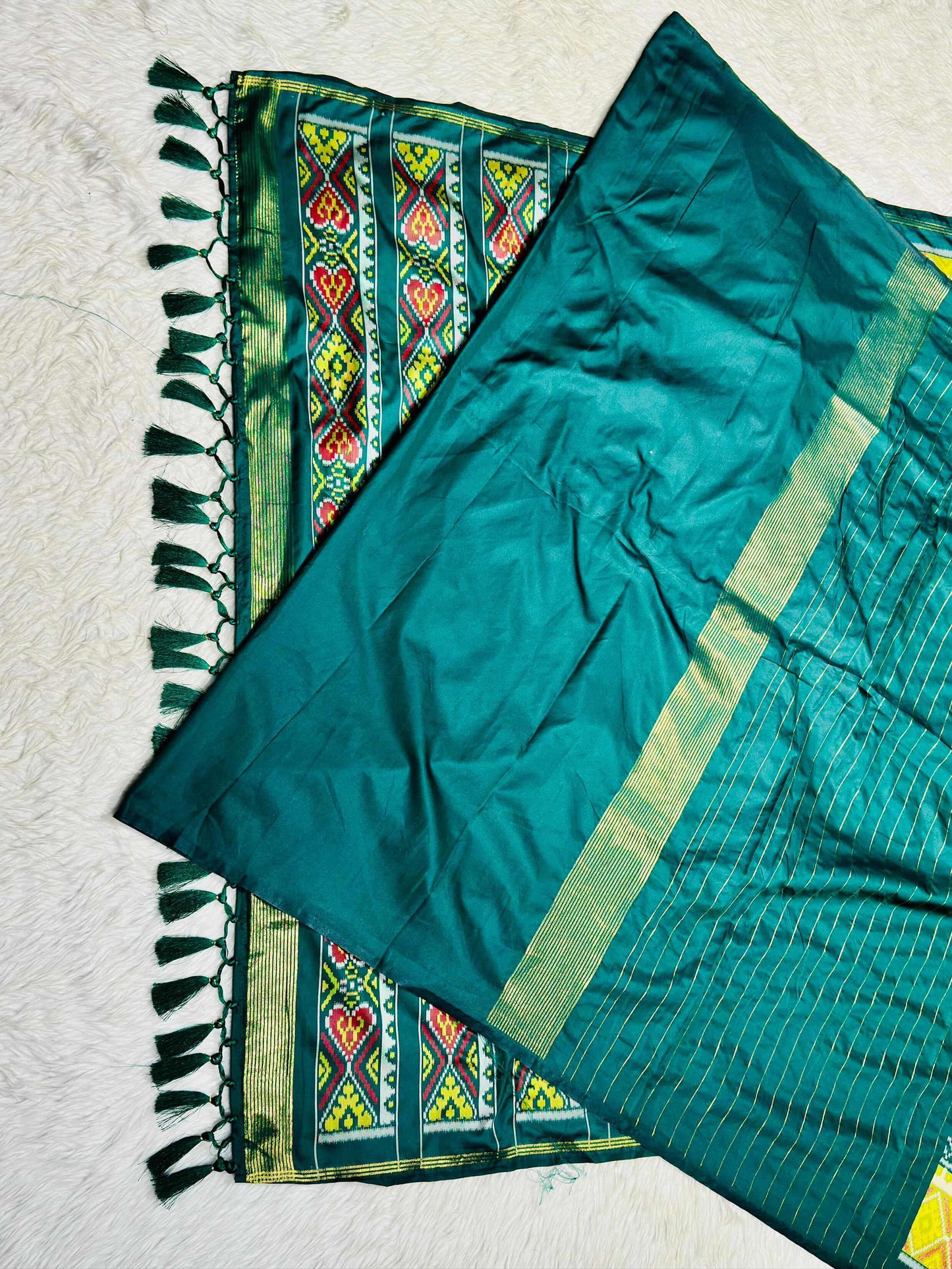 Patola Silk Saree with Tassels & Contrast Border | Designer Ethnic Wear by SHAGUN FASHION