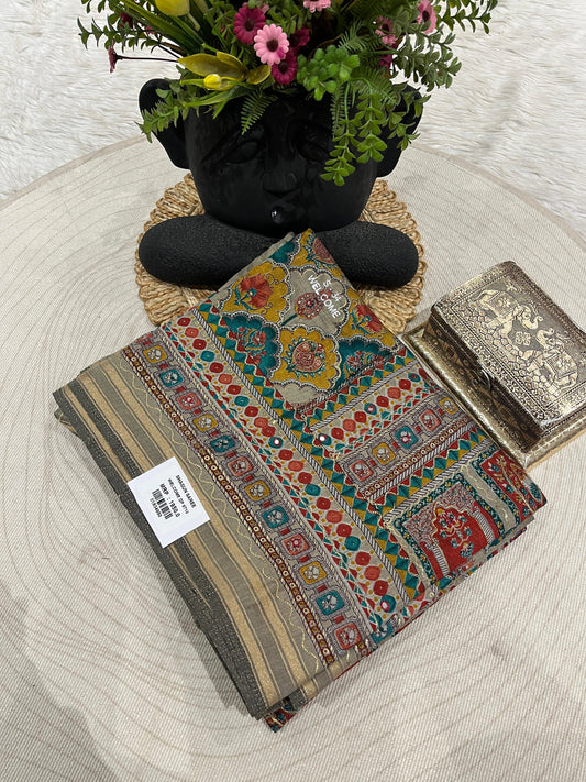 Elegant Beige Printed Saree with Colorful Pallu & Tassels