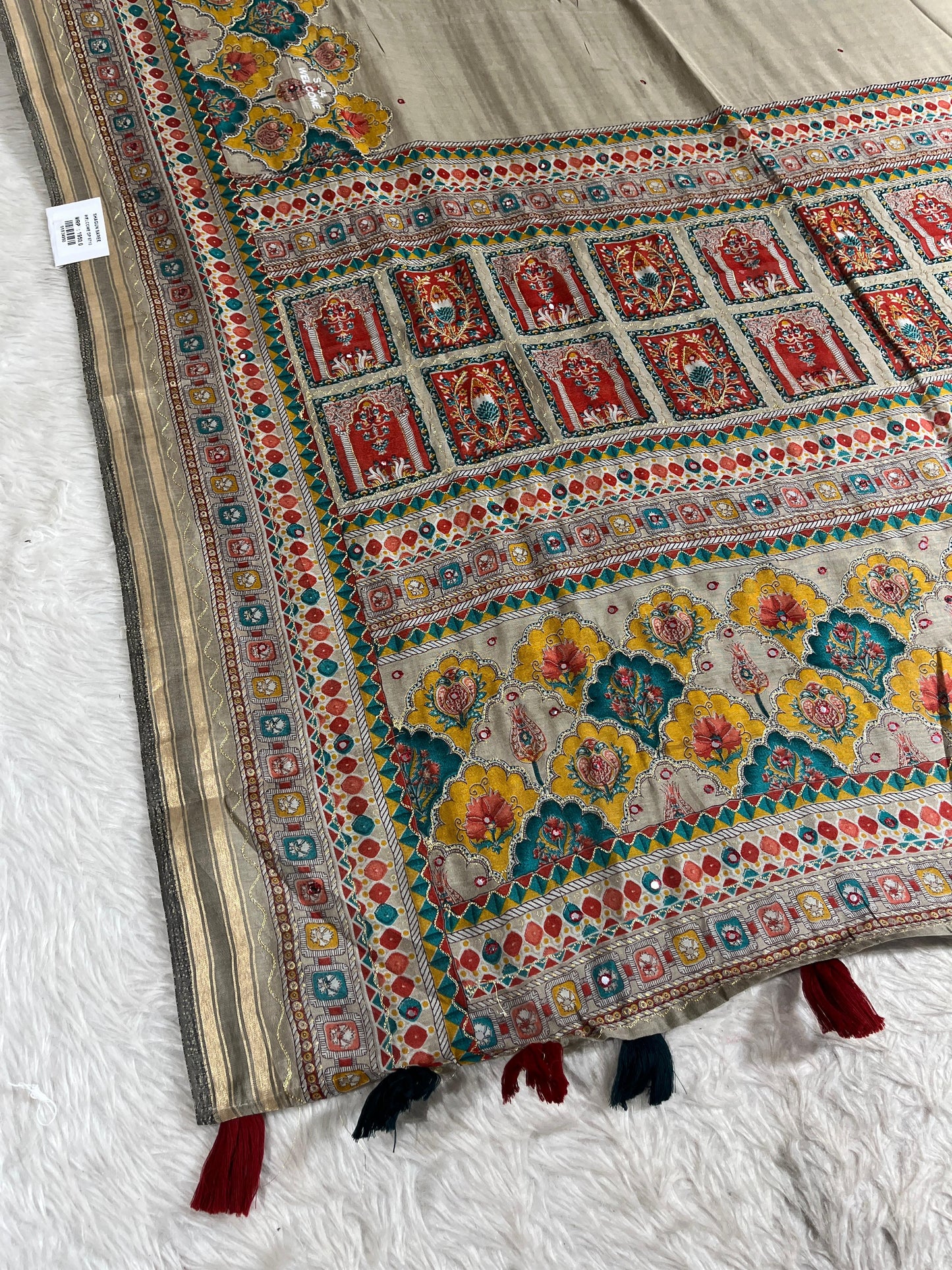 Elegant Beige Printed Saree with Colorful Pallu & Tassels