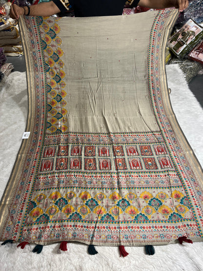 Elegant Beige Printed Saree with Colorful Pallu & Tassels