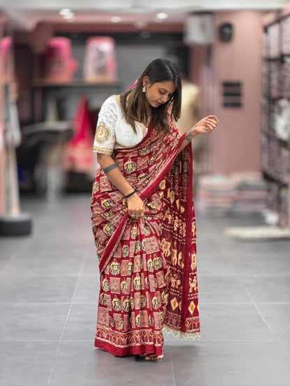 SHAGUN FASHION Traditional Red Ikat Style Saree with Ethnic Motifs | Festive Wear by Shagun Sarees