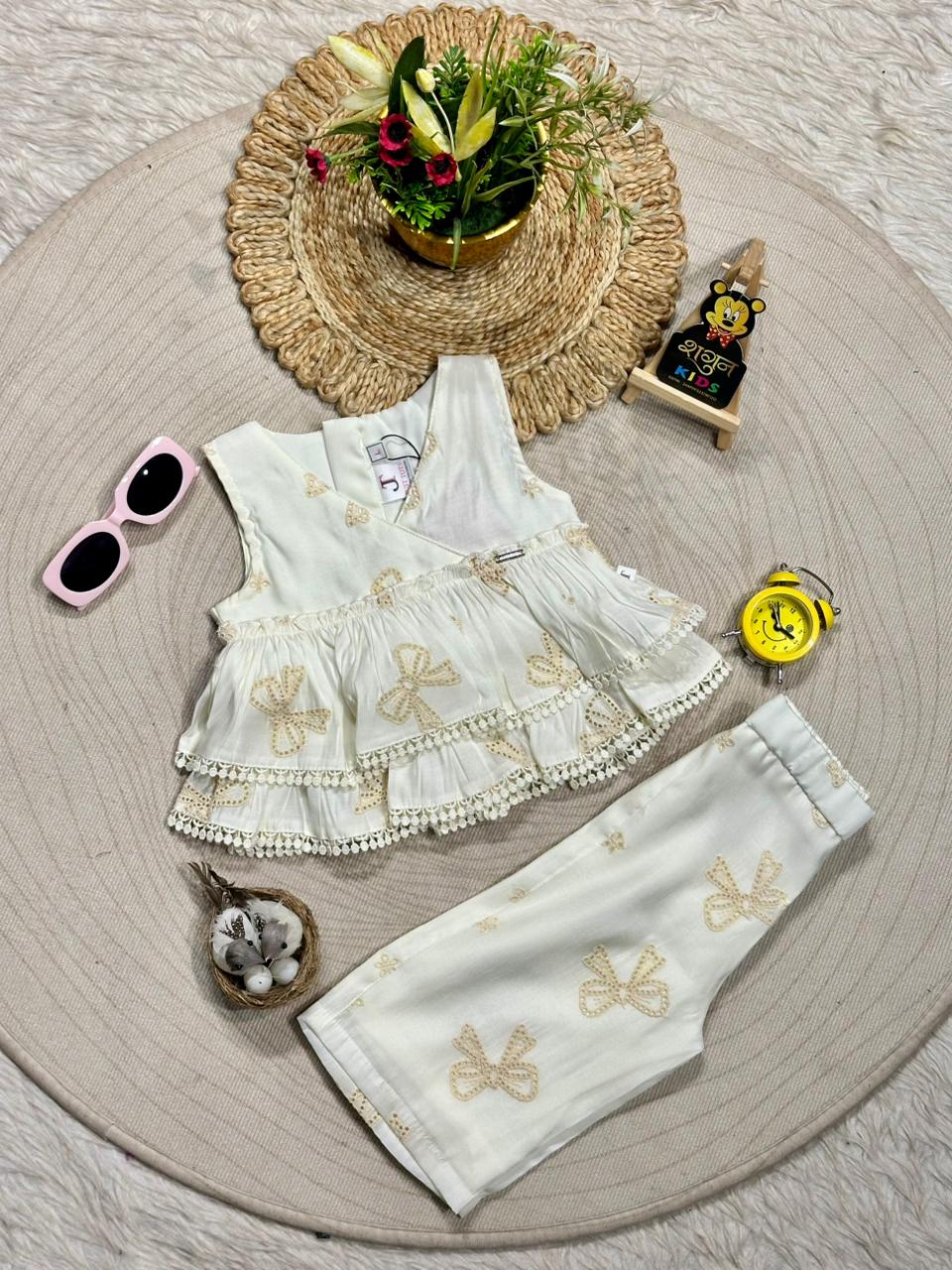 Angelic Beauty: White Embroidered Bow Party Set by SHAGUN FASHION