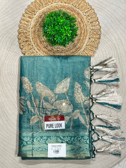 SHAGUN FASHION Premium Pure Look Shimmer Organza Saree with  Floral Border and Traditional Latkan