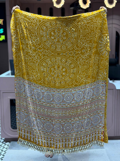 SHAGUN FASHION Exclusive Traditional Bandhani Saree with Heavy Mirror Work Border and Beautiful Ajrakh Print Pallu