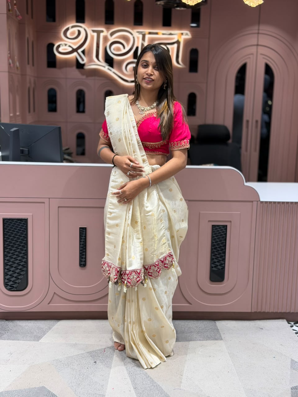Cream Silk Patola Saree with Heavy Designer Border and Latkan