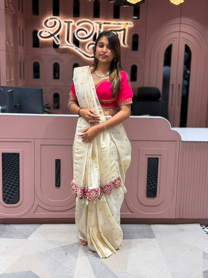 Cream Silk Patola Saree with Heavy Designer Border and Latkan