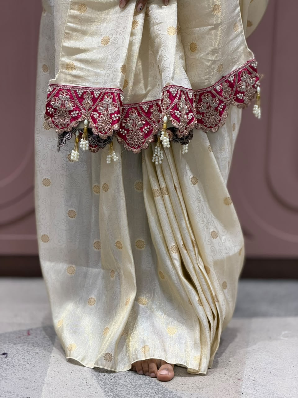 Cream Silk Patola Saree with Heavy Designer Border and Latkan