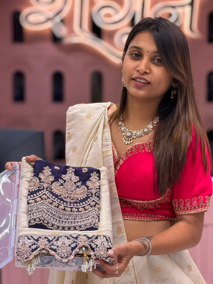 Cream Silk Patola Saree with Heavy Designer Border and Latkan