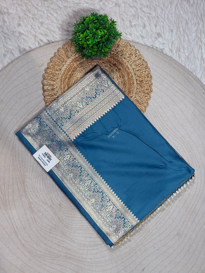 SHAGUN FASHION Exclusive Himanshi Satin Silk Saree with Rich Weaved Zari Pallu & Pearl Latkan