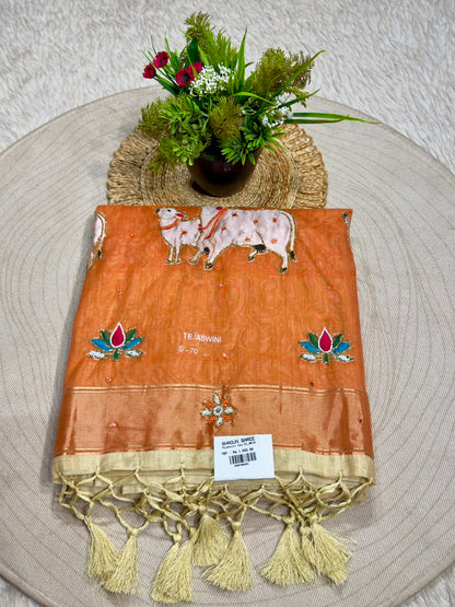 SHAGUN FASHION Premium Tejaswini Organza Saree with Designer Cow (Gau Mata) & Lotus Embroidery Work