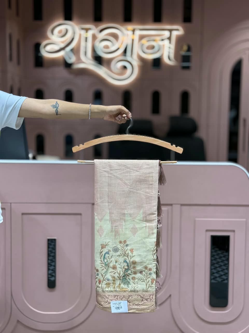 SHAGUN FASHION Pure Look Linen Tissue Saree with Traditional Peacock & Deer Floral Pallu | Elegant Soft Linen Saree with Zari Border & Hanging Tassels