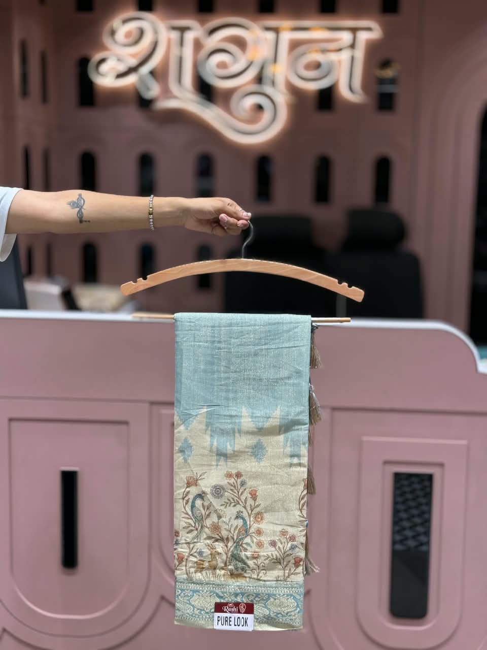 SHAGUN FASHION Pure Look Linen Tissue Saree with Traditional Peacock & Deer Floral Pallu | Elegant Soft Linen Saree with Zari Border & Hanging Tassels