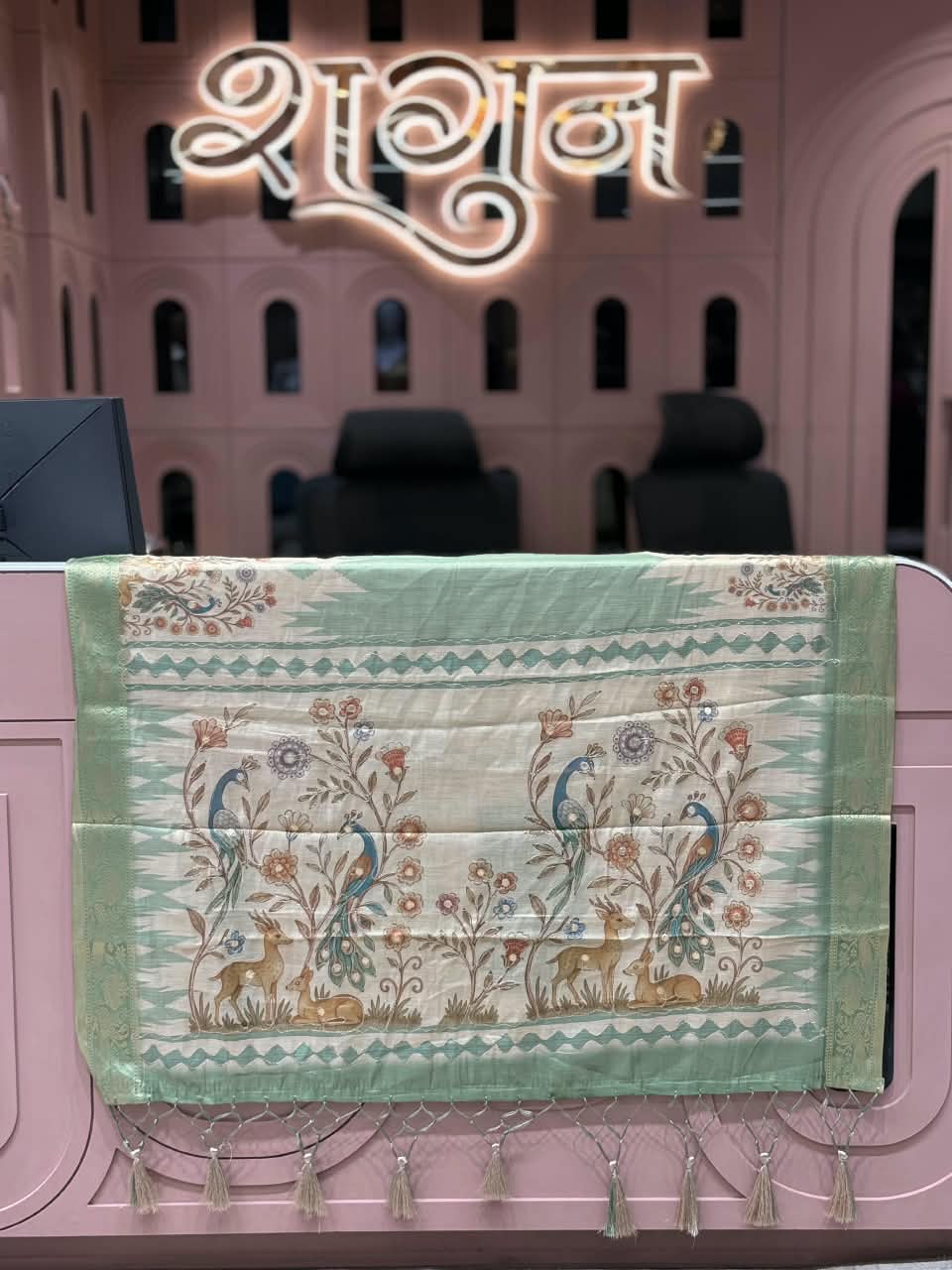 SHAGUN FASHION Pure Look Linen Tissue Saree with Traditional Peacock & Deer Floral Pallu | Elegant Soft Linen Saree with Zari Border & Hanging Tassels